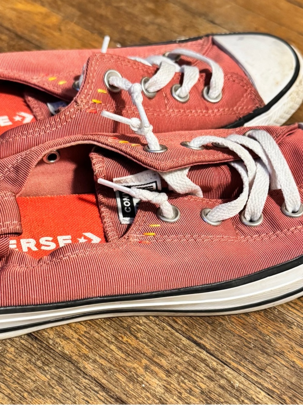 Converse Low-Top Slip-On Sneakers in Rose Pink